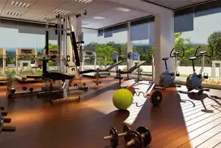 Living room with orange sofa and wooden partition