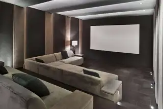 Elegant living room with blue ottoman